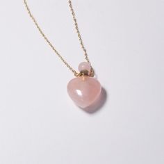 Keepsake Necklace ※ NECKLACE/MATERIAL: You will receive one of the exact items pictured or similar from the same batch, selected at random. Due to the similar nature of these stones we are unable to allow buyers to select their exact pieces at this time. Each piece is guaranteed to be pink rose quartz, though tones and vibrance may vary as depicted in the photos. As is common with natural gemstones, some pieces may have irregularities, hairline inclusions, etc. ※ SIZE/INSTRUCTIONS: Crystal locke Gift Crystal Necklaces With Clavicle Chain And Heart Pendant, Elegant Keepsake Necklaces With Heart Beads, Spiritual Heart Beads Necklaces As Gifts, Spiritual Necklace With Heart Beads For Gifts, Spiritual Necklaces With Heart Beads For Gifts, Valentine's Day Gift Heart Beads Crystal Necklace, Spiritual Pink Charm Necklace For Gift, Spiritual Pink Charm Necklace As Gift, Pink Spiritual Charm Necklace For Gift