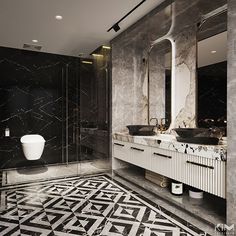 a black and white bathroom with marble flooring, double sinks and large mirror on the wall