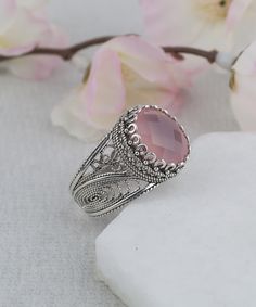 Authentic Aqua or Pink Chalcedony Silver Cocktail Ring,925 Sterling Silver Blue Pink Genuine Gemstones Artisan Crafted Filigree Oval Ring for Women, Jewelry Gifts Boxed for Her The stone measures approximately 10 mm x 12 mm oval and weights approximately 4 carat. Ring Face Length: 0.60 inch Ring face width: 0.50 inch Sizes 5-12 It is like all our jewelry nickel free. This ring will come in a designer pouch, put in gift box and a romance card. Free Shipping It is a gift that will create memories Artisan Pink Ring As Gift, Ornate Oval Rings For Gifts, Handmade Filigree Ring Gift, Oval Filigree Ring Adjustable Gift, Oval Ring With Intricate Design For Gift, Oval Cabochon Rings With Intricate Design For Gift, Ornate Pink Jewelry For Gifts, Oval Rings With Intricate Design, Ornate Pink Jewelry Gift