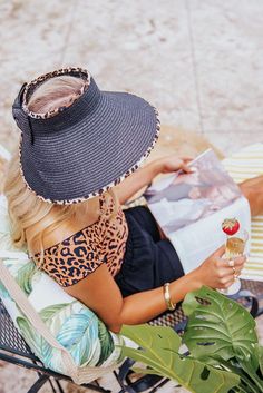 Bring the heat this summer in our trendy black 'Miami Pier' visor featuring lightweight raffia material with leopard print trim detailing, a 5-inch brim, and an adjustable Velcro bow closure in the back! Trendy Black Visor Sun Hat, Adjustable Black Straw Hat For Vacation, Black Straw Hat For Vacation, Black Curved Brim Straw Hat For Vacation, Black Straw Hat With Curved Brim For Vacation, Summer Adjustable Leopard Print Hats, Summer Leopard Print Hats With Adjustable Fit, Trendy Black Straw Hat For Summer, Summer Leopard Print Adjustable Hat