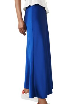 Complete your look with the understated sophistication of this smooth satin midi skirt. Pull-on style 100% polyester Machine wash, line dry Imported Satin Lined Workwear Maxi Skirt, Satin Lined Maxi Skirt For Work, Satin Maxi Skirt For Workwear, Elegant Blue Satin Bottoms, Blue Silk Relaxed Skirt, Blue Silk Relaxed Skirt Bottoms, Blue Silk Lined Bottoms, Blue Silk Lined Skirt, Blue Fitted Satin Skirt