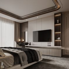 a bedroom with a large bed and a flat screen tv mounted on the wall above it