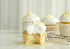 an image of lemon cupcakes with white frosting