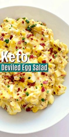 an egg salad on a white plate with the words keto deviled egg salad