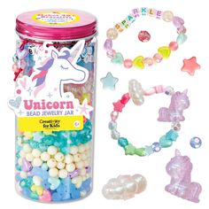 the unicorn bead jewelry jar is filled with beads and bracelets for kids to play in