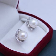 Treat yourself to timeless elegance with these 11-12mm Freshwater Pearl & Rose Floral Earrings from House of Pearls. Classically crafted from freshwater pearls, these earrings exude a classic charm that never goes out of style. The soft, rosy hue of the pearls gives them an added sense of allure, while the simple design keeps them versatile enough to wear it with almost any outfit. Perfect for casual or formal occasions, these timeless studs will add a hint of luxury to any ensemble. This popula Pearl Drop Earrings For Anniversary, Round Pearl Clip-on Earrings For Anniversary, Akoya Pearl Bridal Earrings Gift, Akoya Pearl Bridal Earrings Gift, Round Shape, Round Akoya Pearl Bridal Earrings As Gift, Pearl Rose, Freshwater Pearl Earrings, Freshwater Pearls Earrings, Pearl Types