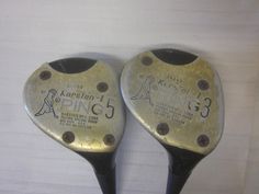 two golf club head covers with holes on them