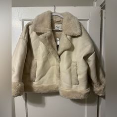 Abercrombie Cream Leather And Fur Winter Coat. 2 Button Snap To Close. Xl And Nwt. Such A Warm, Gorgeous Jacket For Winter. I Want To Keep It It’s Just Too Big On Me Cream Outerwear With Double Button Closure And Lapel Collar, Winter White Buttoned Outerwear For Fall, Fall Cream Outerwear With Button Closure, Winter Cream Blazer With Double Button Closure, Winter White Outerwear With Button Closure For Work, Classic Beige Outerwear With Faux Fur Lining, Cream Collared Winter Outerwear, Winter White Single Breasted Outerwear With Lapel Collar, Collared Winter White Outerwear For Fall