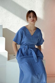 "French blue V-neck short sleeve dress. Dress with pockets and long belt. THE DRESS IS 120 cm long. --------------If you want a different length of the dress let me know.--------------- Choose size: XS Bust 82 - 84 cm. ( 32 1/4\" - 33\") Waist 66 - 68 cm. / (26\" - 26 3/4\") Hips 90 - 92 cm. / (35 1/2\" - 36 1/4\") dress length for this size is 110 cm/43.3\" S Bust 86 - 88 cm. ( 33 3/4\" - 34 3/4\") Waist 70 - 72 cm. / (27 3/4\" - 28 1/4\") Hips 94 - 96 cm. / (37\" - 37 3/4\") dress length for t Belted V-neck Summer Dress, V-neck Linen Dress For Workwear With Relaxed Fit, Relaxed Fit Linen V-neck Dress For Work, Summer V-neck Belted Midi Dress, V-neck Linen Midi Dress With Belt, Belted V-neck Daywear Dresses, Elegant V-neck Linen Dress With Pockets, Spring V-neck Linen Dress, Relaxed Fit V-neck Dress With Tie Waist