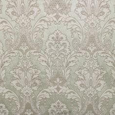 an old wallpaper pattern with white flowers and leaves on green background, close up