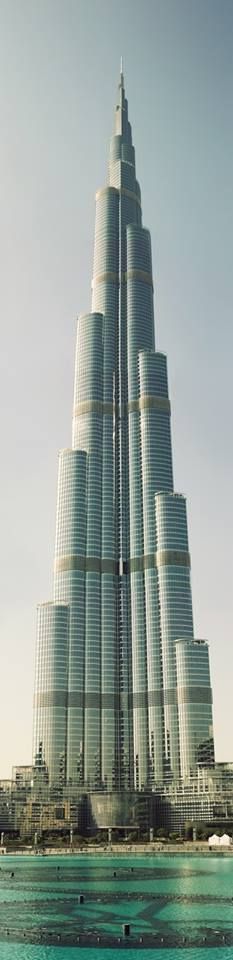 the burj building is very tall and has many windows