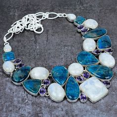 Rainbow Moonstone Blue Apatite Amethyst Silver Plated Necklace, Unique Designer Jewelry, Chunky Necklace, Handmade Jewelry, Choker Necklace Please note : As this stone is natural, texture of every stone is different. so, the product you get in hands may slightly vary from the picture shown and not exact same as picture . And this is the beauty of each necklace being different than other. ♥ Crafted with the help of trained and experienced artisans team ♥ Our products are handmade with quality gem Blue Amethyst Pendant Necklaces, Blue Moonstone Jewelry With Stones, Blue Amethyst Pendant Necklace, Handmade Blue Amethyst Crystal Necklaces, Handmade Blue Amethyst Crystal Necklace, Blue Gemstone Crystal Necklaces, Blue Gemstone Crystal Necklace, Handmade Blue Amethyst Necklace, Unique Blue Gemstone Crystal Necklace