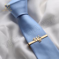 Introducing our Personalized Tie Clip, the perfect accessory for the modern man. Handcrafted with precision, this tie clip is not only a functional piece of attire but also a meaningful keepsake. It is an ideal choice for wedding gifts, anniversary gifts, and a heartfelt present for dad. This tie clip is more than just a piece of men's fashion, it's a of style, sophistication, and sentimentality. This tie clip is meticulously made from high-quality stainless steel that ensures durability and lon Luxury Business Cufflinks For Father's Day, Luxury Cufflinks For Men - Father's Day Gift, Gold Clip-on Cufflinks For Business, Silver Clip-on Cufflinks For Formal Events, Personalized Tie Clip, Wedding Gifts For Men, Personalized Tie, Casual Night Out, Presents For Dad