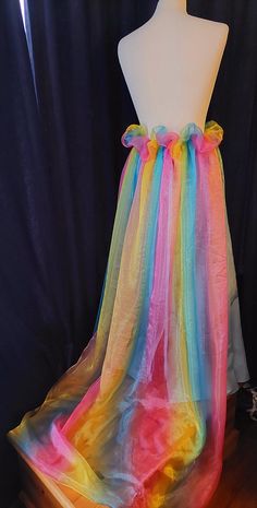 Perfect to finish off your alternative outfit, this handmade blue skirt with a frothy rainbow bustle skirt is ideal for anyone to be worn with pride!! layers of rainbow tulle sweeping out at the back designed to make a impact, finished with matching blue underskirt, laced up at the back for ease with matching ribbons.  waist to hem (back) 39 inches size UK 14. Multicolor Tulle Skirt For Summer, Rainbow Tulle Skirt, Bustle Skirt, Alternative Outfits, Blue Skirt, Women's Costumes, Tulle Skirt, Favorite Outfit, Etsy Accessories