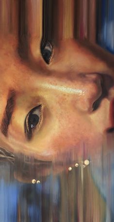 a painting of a woman's face and eyes reflected in the water on a glass surface