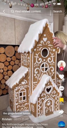 a gingerbread house is decorated with white icing