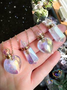 These Angel Aura Essential Oil Crystal Bottle Pendants are absolutely stunning! All of them come on a 25 inch Gold plated over Brass chain. Fill these with your own personal aroma therapy essential oil blend. Perfect for yourself or a gift to a special person in your life. Iridescent Magical Pendant Necklace, Magical Iridescent Pendant Necklaces, Magical Iridescent Pendant Necklace, Mystical Iridescent Crystal Necklaces For Gift, Mystical Iridescent Crystal Necklace For Gift, Spiritual Iridescent Necklace For Gifts, Mystical Iridescent Necklaces As Gifts, Magical Iridescent Jewelry For Gifts, Gold Mystical Crystal Necklace For Meditation