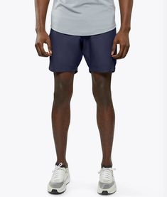 The ultimate shorts for the course, office, and everything in between. Available in 7" inseams, these shorts are crafted from high-quality materials for optimal durability and comfort. With their stylish design and practicality, these are a must-have for modern men who demand the best. MB10393N Navy Nylon Shorts, Blue 4-way Stretch Shorts, Navy Functional Shorts, Navy Go-dry Short Length Bottoms, Functional 4-way Stretch Shorts, Navy Short Length Swim Trunks, Navy Go-dry Shorts, Functional Navy Shorts, Navy Go-dry Athletic Shorts