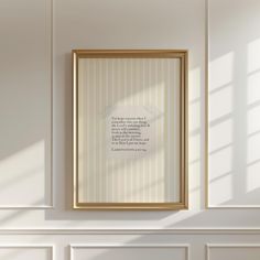 a framed photograph hanging on the wall next to a fireplace with a quote above it