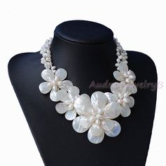 "Applications: wedding, engagement, daily wear,party Material: Natural Freshwater Pearl, shell beads size :5-6-8mm/0.196\"-0.23-0.31\" ,15*20mm /0.59*0.787\";20*30mm/0.787*1.18\" length:18inches (1\"=2.54cm=25.4mm,1cm = 0.39 inch). Color: As show We can adjust the length of your requirements This beautiful Necklace is the perfect addition to any wardrobe. This versatile necklace can be worn with just about everything. All the product are designed and made by myself so if you want any adjustments Gift Friend, Ocean Inspired, Pearl Shell, Ocean Inspiration, Shell Beads, Beautiful Necklace, Gift Wedding, Flower Necklace, Wedding Necklace