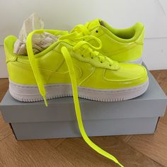 Brand New With Box Size Is 5 Youth/6.5 Women. Neon Patent Leather With White Sole. Nike Neon Yellow Lace-up Sneakers, Trendy Neon Yellow Sneakers For Streetwear, Nike Neon Yellow Sneakers For Streetwear, Neon Yellow Nike Sneakers For Streetwear, Trendy Neon Yellow Low-top Sneakers, Yellow Nike Air Force 1 With Round Toe, Nike Air Force 1 Yellow With Round Toe, Yellow Nike Air Force 1 Lace-up For Streetwear, Yellow Nike Shoes