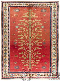 an old rug with red and blue colors on the bottom, surrounded by gold trimmings