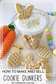 some cookies and carrots are on a white table with bunny ears in the middle