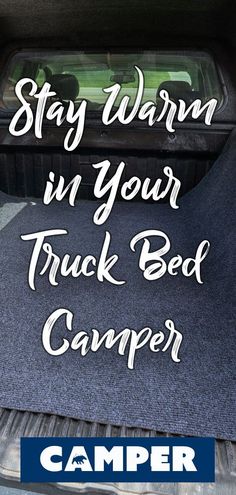 the back end of a truck with text saying stay warm in your truck bed camper