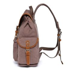 Set forth on your daily journey with the Shady Cove Backpack, a meticulously handcrafted piece that marries the ruggedness of adventure gear with the finesse of artisanal craftsmanship. Constructed from high-quality cotton canvas and adorned with genuine leather accents, this backpack symbolizes durability wrapped in elegance. It reflects your dedication to an eco-friendly and style-conscious way of life. | TSD Brand Shady Cove Backpack, Brown Brown Large Capacity Backpack For Outdoor Activities, Brown Backpack With Leather Handles For Outdoor, Brown Adjustable Backpack For Everyday Use, Adjustable Brown Backpack For Everyday Use, Brown Leather Backpack For Outdoor With Canvas Lining, Outdoor Leather Trim Satchel Backpack, Brown Leather Backpack For Adventure With Canvas Lining, Brown Leather Backpack With Canvas Lining For Adventure, Rugged Backpack For Outdoor Activities With Leather Handles