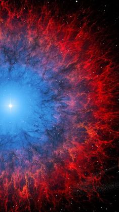 an image of a blue and red eyeball in the sky with stars around it