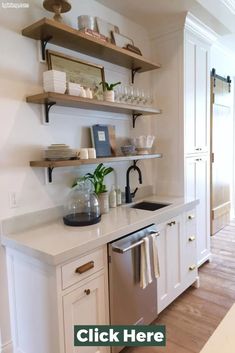 Floating kitchen shelves have become a popular trend in modern interior design, offering both functional storage and stylish decor. These shelves are mounted directly onto the wall without any visible support, creating the illusion of a floating structure. They come in various materials, such as wood, metal, and glass, and can White Floating Shelves Kitchen, Wood Floating Shelves Kitchen, Kitchen Floating Shelves Decor, White Kitchen Shelves, House Reference, Wooden Shelves Kitchen, Floating Kitchen Shelves, Floating Kitchen, Kitchen Open Shelves