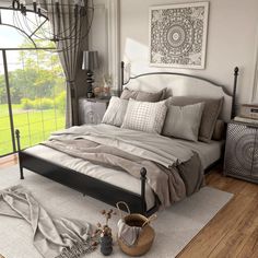 a bedroom with a large bed and lots of pillows