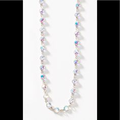 This Is The Touchstone Crystal Chanelle Necklace With Swarovski Crystals In Aurore Boreale. The Necklace Is An Endless Chain 36 Inches And Looks Great Alone Or Spectacular When Layered! As In Photo 2. Wear It Long Or Doubled Up With A Converter. A Wardrobe Essential! New In Box. Retail 102 Iridescent Crystal Necklaces For Party, Iridescent Crystal Jewelry With Rhinestones, Crystal Necklaces With Sparkling Round Beads, Iridescent Crystal Jewelry With Faceted Beads, Elegant Iridescent Crystal Necklaces, Elegant Iridescent Crystal Necklace, Swarovski Heart Necklace, Interlocking Circle Necklace, Swan Necklace