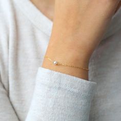 Dainty and classic, our Aura tiny pearl bracelet is a beautiful piece to wear everyday. Simple and timeless, you can wear it with everything. P R O D U C T * D E T A I L S - Pearl measures approximately 3.5mm - Available in Sterling Silver, 14k Gold Filled and 14k Rose Gold Filled - Each freshwater pearl is unique meaning the size and shape may vary - Wire wrapping detail - Available in Sterling Silver, 14k Gold Filled and 14K Rose Gold Filled L E N G T H - This bracelet is measured opened from Dainty Oval Adjustable Bracelets, Dainty Pearl Jubilee Bracelet As Gift, Adjustable Oval Dainty Bracelets, Dainty Oval Chain Bracelet, Dainty Oval Bracelet For Everyday, Dainty Oval Chain Bracelet Gift, Dainty Oval Bracelet As Gift, Dainty Oval Bracelets As Gift, Dainty Oval Bracelets For Gifts