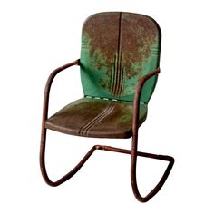 an old metal chair with green paint on it's back and seat, sitting in front of a white background