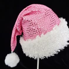 "This festive Santa hat is made up in a pink metallic dot pattern fabric. Great novelty party hat for your holiday celebration. Hat is styled in the traditional cone style stocking cap for Santa. The metallic fabric is lined with a layer of cotton fabric and the hat is accented with a band of fluffy white faux fur fabric trim. Proportions of the hat are generous and will fit most head sizes, ladies or gents. Hat is a soft slouch cone style. Measurement for opening for your head is 24-25\" circum Silver Santa Hat, Pink Winter Party Hats, Adjustable Christmas Party Hats, Adjustable Pink Hats For Celebration, Pink Adjustable Hat For Celebration, Pink Adjustable Hat For Celebrations, Adjustable Pink Mini Hat For Celebration, Santa Costume, Holiday Hats