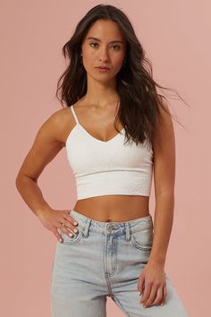 Update your loungewear collection with this versatile brami, meticulously designed for both layering and lounging. Boasting adjustable straps and padding, it offers a customizable and comfortable fit. Trendy Crop Top With Built-in Bra For Loungewear, Spring Cami Sports Bra With Built-in Bra, Trendy Sports Bra With Built-in Bra For Spring, Summer Cami Sports Bra With Built-in Bra, Cami Bra For Loungewear, Trendy Bra-friendly Camisole Crop Top, Spring Cropped Sports Bra With Built-in Bra, Trendy Tank Straps Crop Top For Loungewear, Trendy Bra-friendly Cami Crop Top