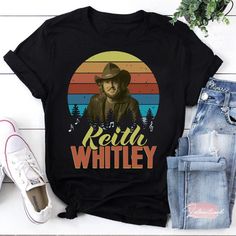 Product details: ✔️ TITLE NAME: Retro Keith Whitley Sandy T-Shirt, Keith Whitley Shirt, Singer Shirt, Country Music Lover Shirt, Musician Gift ✔️ IMPORTANT NOTE: Both Men and Women can we our shirts because this is unisex style t-shirts;  Wash item inside out in cold water, do not bleach, do not dry clean, do not iron directly on the design. ✔️ MATERIAL: 5.3-ounce, 100% cotton (99/1 cotton/poly (Ash) & 90/10 cotton/poly (Sport Grey); Heavyweight classic unisex tee; Taped neck and shoulders; Tearaway label; Decoration type: Digital Print ✔️ OUR DESIGN PRODUCTS: Each One are designed and sold in limited quantities. The designs are created by our incredibly talented in house graphic art team who often hand draw and illustrate each Tee shirt design. ✔️ SIZE CHART: Please refer the attached siz