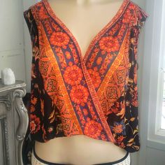 Free People Blouse. Nwt. Orange Black Sheer Festival Floral Print V-neck Top, Bohemian Fitted Rayon Top, Fitted Bohemian Rayon Top, V-neck Floral Print Top For Festival, Festival V-neck Floral Print Top, Bohemian Sleeveless Blouse With Floral Print, Bohemian V-neck Floral Print Crop Top, Festival Floral Print Rayon Tops, V-neck Rayon Top For Festival