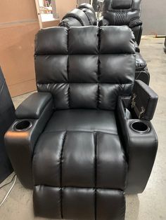 two recliners sitting next to each other in a room