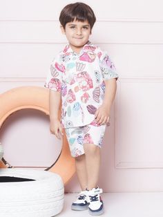 Stylish Abstract Design: - This set features a coordinated design with a matching shirt and shorts, creating a fashionable and put-together look for boys. - The abstract design ensures a hassle-free outfit choice and saves time when getting dressed. .Sales Package:- 1 Shirt & 1 Short  .Style:- Co-ord Set for kids Cotton Fabric: - Boys Co-Ord Set is crafted from cotton fabric, known for its softness, durability, and breathability. - Fabric provides a comfortable wearing experience, allowing for u Pink Cartoon Print Summer Sets, Playful Summer Sets With Cartoon Print, Casual Short Sleeve Playwear Set, Pink Summer Sets With Cartoon Print, Playful Graphic Print Summer Sets, Playful Graphic Print Sets For Summer, Pink Cotton Short Set For Beach, Pink Graphic Print Sets For Summer, White Beach Season Playwear Sets