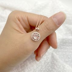 14K Round Morganite Diamond Necklace / Morganite Pendant / Morganite Necklace / Rose Gold / Diamond Necklace / Necklace for Women ◈ Please check our shop ---> https://etsy.me/3l5L3fn ◈ Necklace Shop ---> https://etsy.me/3QzCmci ◈ Item Details ◈ --- Handmade in United States --- Made to Order --- Metal: Solid 14K Gold (Rose Gold) --- Pendant Size: 17 x 11 mm (With Bail) --- Center Stone: Natural Round Morganite --- Center Stone Size: 8 mm --- Center Stone Carat Weight: Approx: 2.3 CT --- 100% Rea Elegant Round Cut Morganite Jewelry, Luxury Pink Gold Morganite Jewelry, Dazzling Gemstone Round Pendant Necklace, Exquisite Pink Gemstone Necklaces, Exquisite Pink Gemstone Necklace, Luxury Rose Gold Halo Setting Jewelry, Luxury Rose Gold Jewelry With Halo Setting, Dazzling Rose Gold Necklace For Gift, Dazzling Rose Gold Necklace Gift