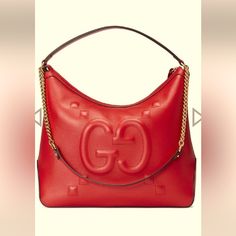 Elevate Your Style With This Stunning Gucci Shoulder Bag. Crafted In Italy From Premium Red Leather, This Large-Sized Hobo Bag Is Perfect For Carrying Your Daily Essentials. The Bag Features An Embossed Apollo Logo Pattern And Is Complemented With Gold Hardware For A Chic And Sophisticated Look. With A Zip Closure And A Strap Drop Of 10 Inches, This Bag Is Both Practical And Stylish. The Exterior Is Made Of Top-Quality Leather That Ensures Durability And Longevity. Ideal For Women Who Want To Ma Chic Gucci Shoulder Bag With Logo, Red Gucci Bag With Chain Strap, Gucci Evening Bags With Logo, Elegant Gucci Shoulder Bag With Logo, Red Designer Shoulder Bag With Logo, Designer Red Shoulder Bag With Logo, Apollo Logo, Gucci Hobo Bag, Canvas Leather Bag