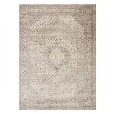 an antique rug with white and beige colors on the ground, in front of a white background