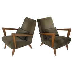 pair of mid century modern lounge chairs in olive green velvet