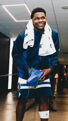 NBA Minnesota Timberwolves star Anthony Edwards in the locker room with one shoe off in his hand and a towel around his neck Basketball Background Aesthetic, Basketball Wallpapers, Wallpaper Background Aesthetic, Basketball Boys, Aesthetic Sports, Basketball Background, Basketball Photos, Basketball Wallpaper