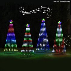 lighted christmas trees with musical notes on them