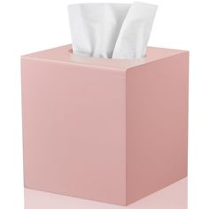 a pink tissue dispenser on a white background