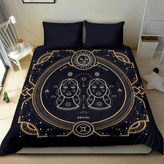 a black and gold bed with two dogs in the center, surrounded by golden lines