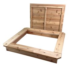 a bed frame made out of wood with drawers on the top and bottom sides,